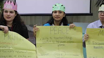 Peacebuilding Training Participants in Crowns with Truth, Peace and Mercy for activity